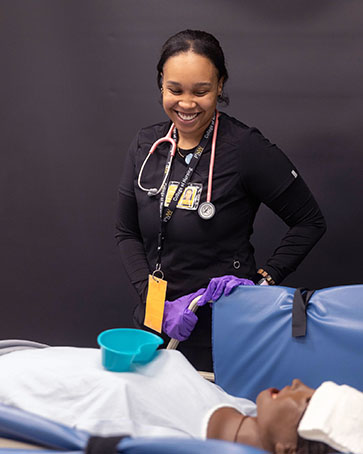 A PNW nursing student works with a virtual patient